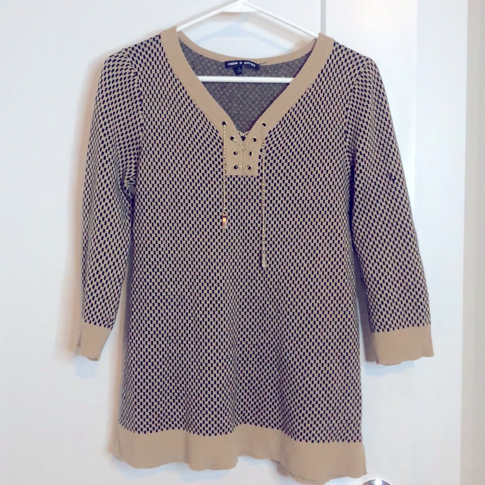 Sweater with gold-color neck chain